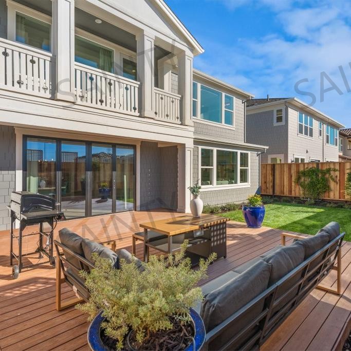 Installed SAINTY™ casement windows on a modern US residential house, showcasing AAMA 2604 white finish.