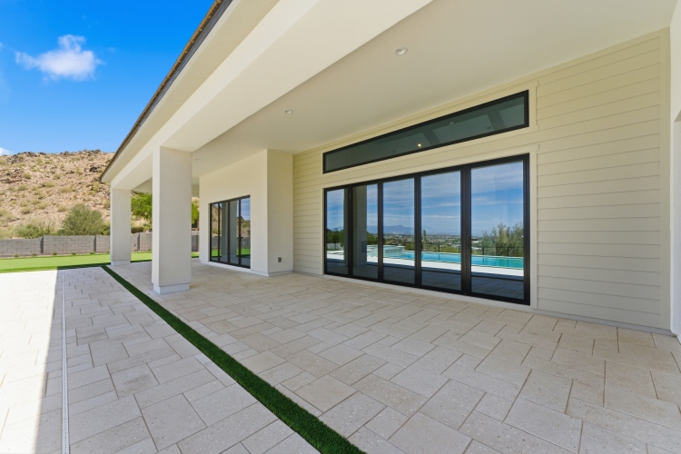 Installed SAINTY bi-fold door in a United States residential house meeting hurricane wind load codes.